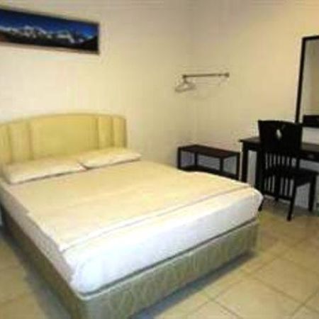 Mendu Inn Kuching Pokoj fotografie