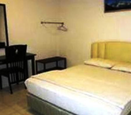 Mendu Inn Kuching Pokoj fotografie